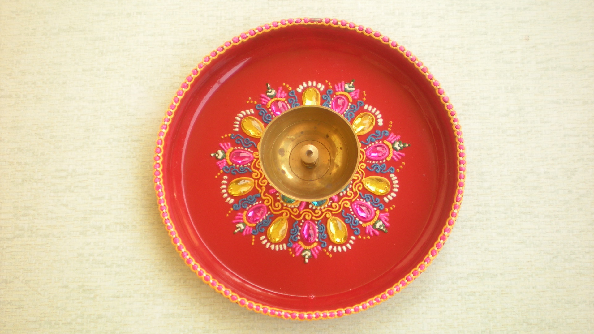 Manufacturers Exporters and Wholesale Suppliers of Decorated Pooja Thalis with Ceramic Art Work Nagpur Maharashtra